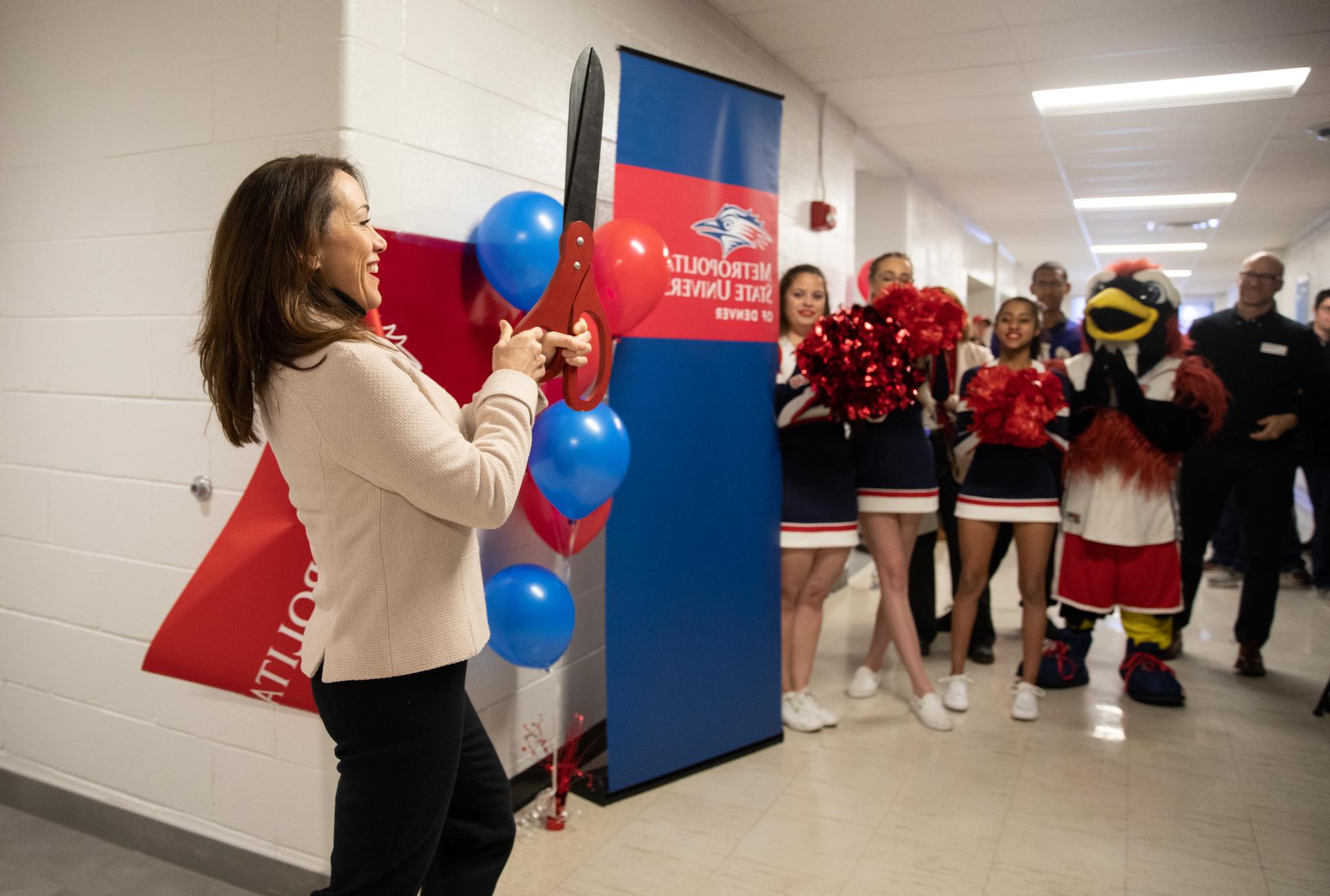 Dr. Davidson cut the ribbon