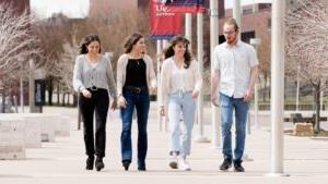 Molnar Quadruplets walking on campus