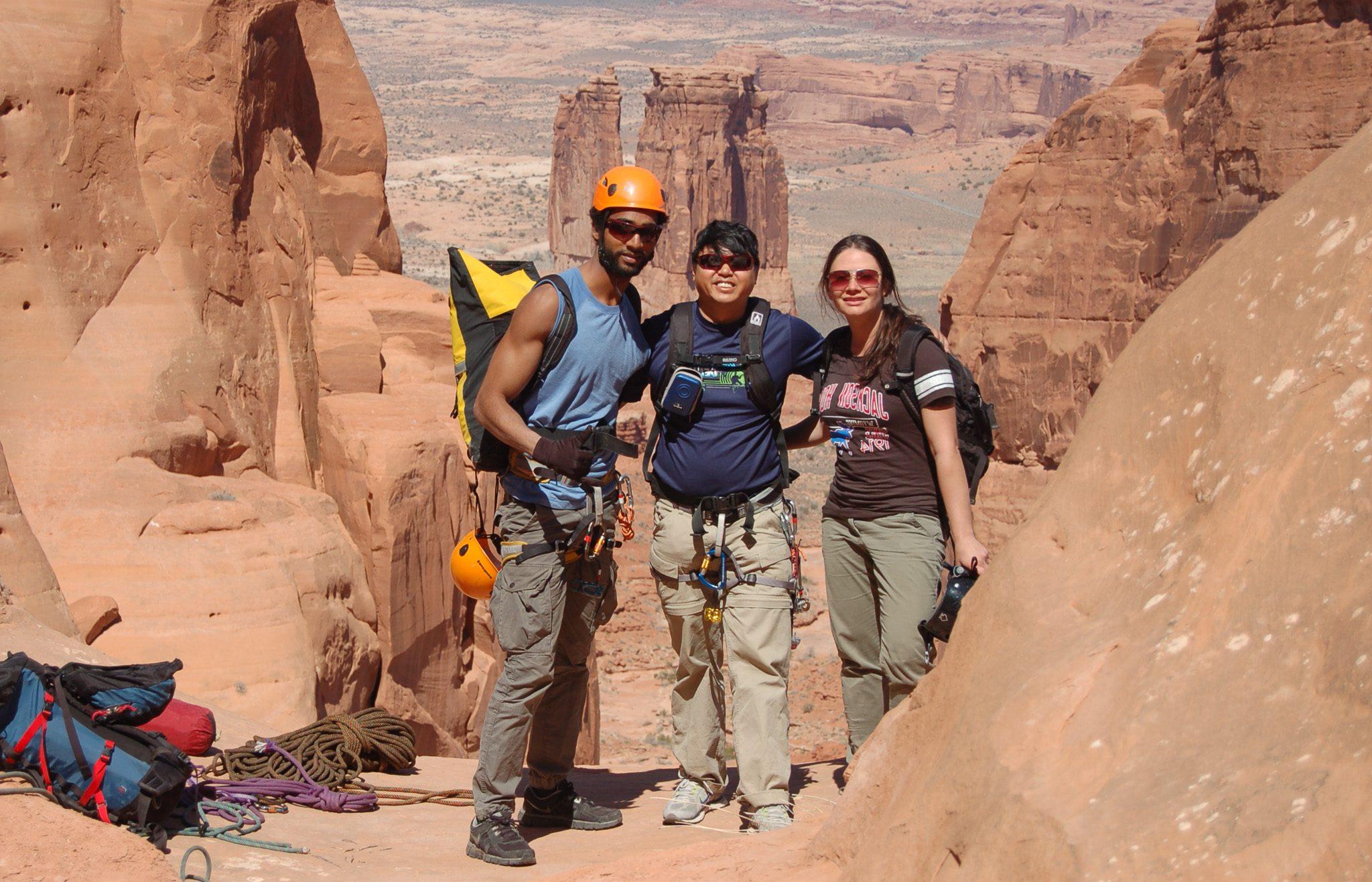 Three climbers in canyon country